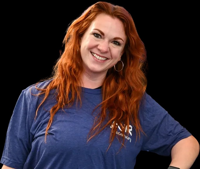 Smiling Ayr Budtender in a blue Ayr t-shirt